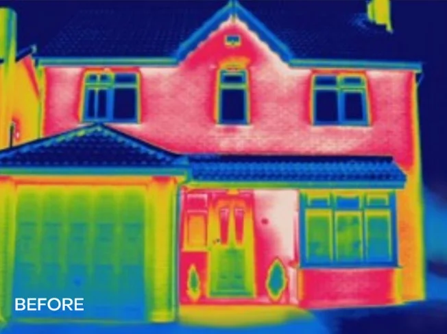 Thermal image showing heat escaping from home before insulation
